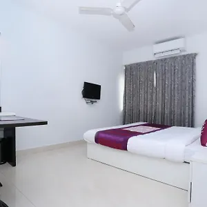 Super Townhouse Malabar Illam Hotel